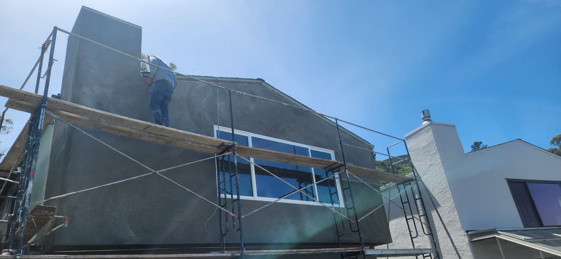 Finished residential exterior in the San Francisco Bay Area after dry rot repair and siding work by Gadget Construction